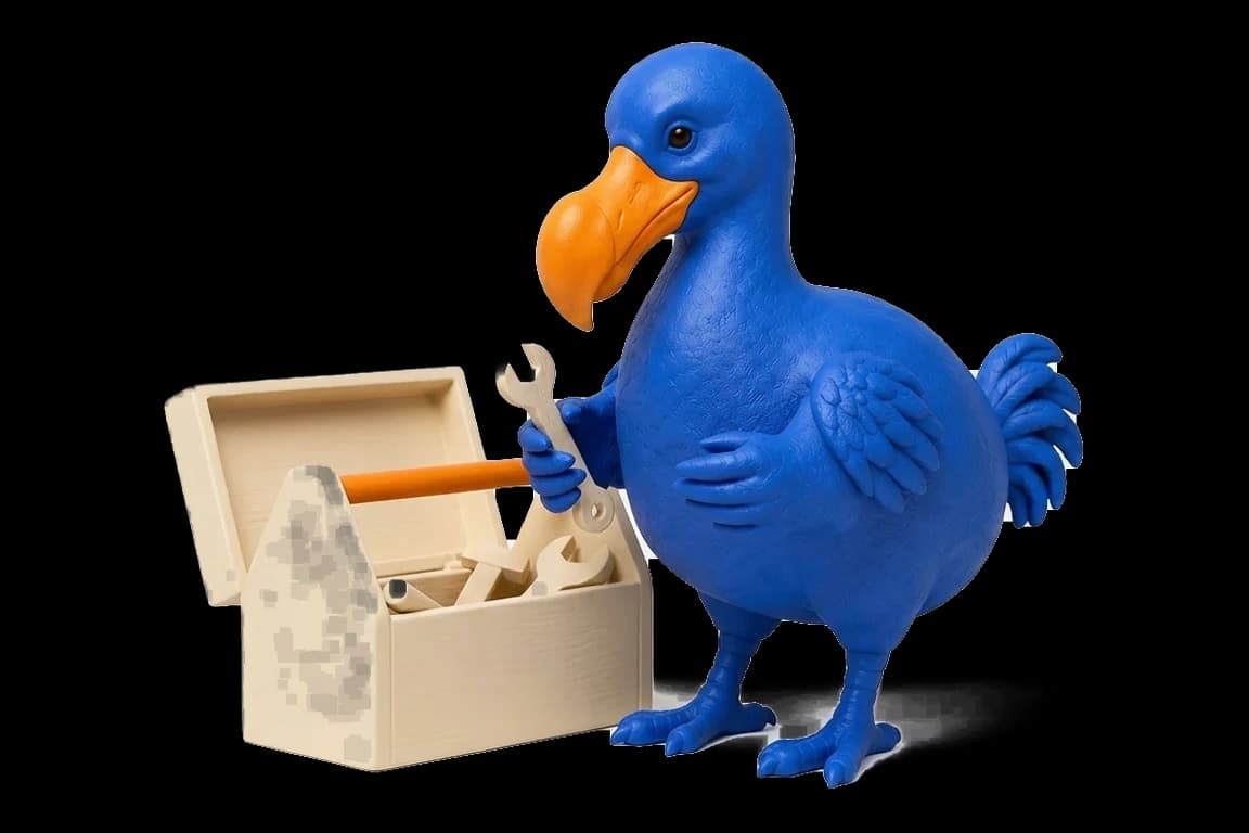Le dodo bleu tient une clé ivoire à côté d’une boîte à outils en bois ivoire à poignée orange.